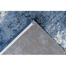 Woonkamer vloerkleed met blauwe Elysée franjes