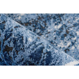 Woonkamer vloerkleed met blauwe Elysée franjes