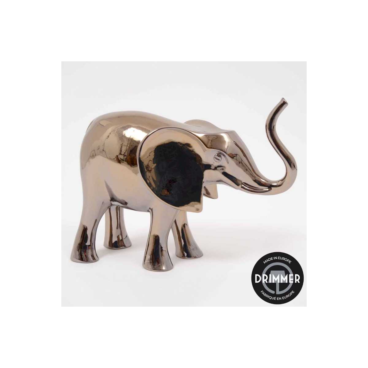 INTERIEUR-DECORATION|EVASION éléphant or 45cmDRIMMERStatues FunnyEVASION éléphant or 45cm Éléphant décoratif EVASION or 45 cm, sculpture design au style élégant et contemporain. Véritable objet de décoration haut de gamme, cet éléphant doré apporte une touche de prestige, de raffinement et d’exotisme à votre intérieur. Idéal pour sublimer un salon, une entrée ou une console, il s’intègre parfaitement dans une décoration chic, moderne ou ethnique luxe. &nbsp;